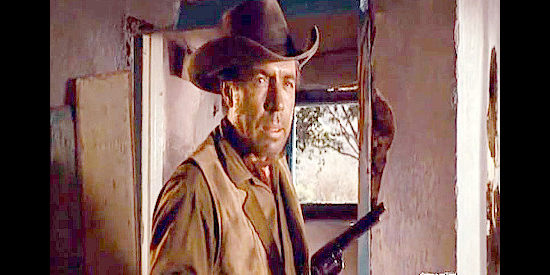 Michael Pate as Frank Boone, one of a trio of brothers trying to even a score with Lee Sutton in Return of the Gunfighter (1967)