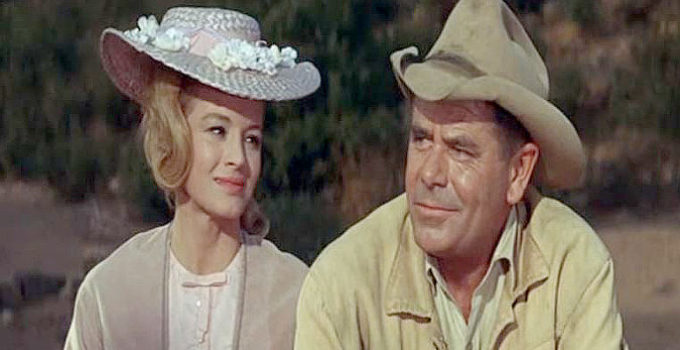 Angie Dickinson as Lisa Denton and Glenn Ford as Marshal Dan Blaine in The Last Challenge (1967)