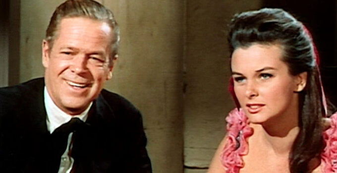 Dan Duryea as WIllie Duggan and Audrey Dalton as Carole Ridgeway, dreaming of a fresh start in a new place in The Bounty Killer (1965)