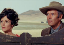 Janice Rule as Molly Riordan and Henry Fonda as Will Blue, about to confront a madman in Welcome to Hard Times (1967)