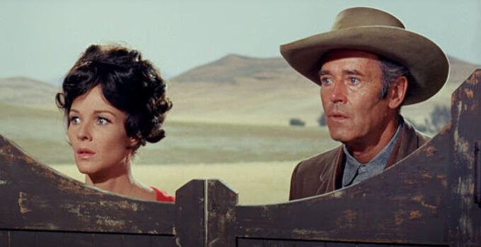 Janice Rule as Molly Riordan and Henry Fonda as Will Blue, about to confront a madman in Welcome to Hard Times (1967)