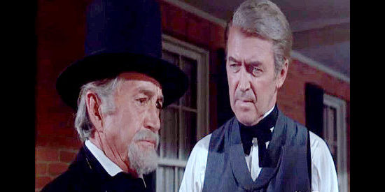 Paul Fix as Doc Witherspoon, reflecting on the high cost of war with Charlie Anderson (James Stewart) in Shenandoah (1965)