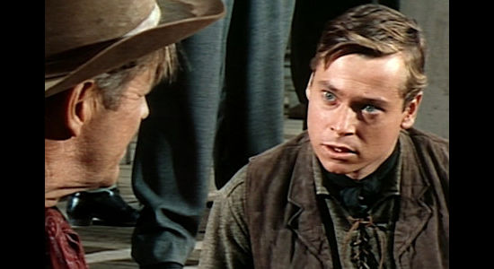 Peter Duryea as a young man looking for insight on killing men and collecting bounties in The Bounty Killer (1965)