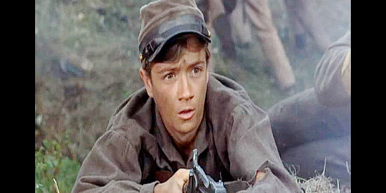 Phillip Alford as Boy Anderson, finding himself fighting in a war his father desperately tried to keep his family out of in Shenandoah (1965)