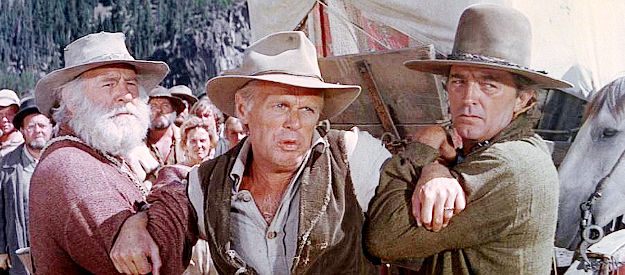 Richard Widmark as Lije Evans, reacting when Tadlock suggest lynching his son, with Dick Summers (Robert Mitchum) helping hold him back in The Way West (1967)