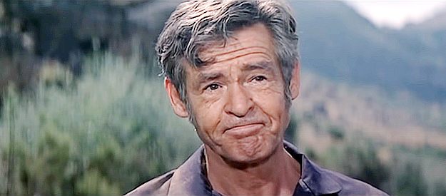 Robert Ryan as Sgt. Patrick Mulligan, caught prospecting instead of soldiering in Custer of the West (1967)