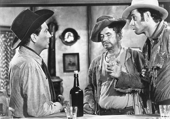 Robert Taylor as mine owner Gallagher with Noah Beery Jr. as Buffalo Baker and Ralph Taeger as Hondo Lane in Hondo and the Apaches (1967)