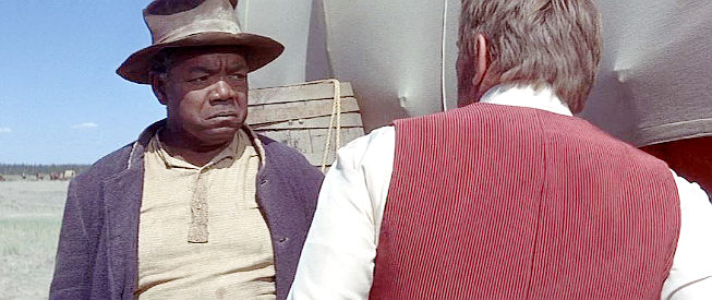 Roy Glenn as Saunders, Tadlock's assistant, disagreeing with his boss in The Way West (1967)