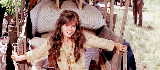 Sally Field as the teasing, coming-of-age Mercy McBee, flashing a smile for Brownie in The Way West (1967)