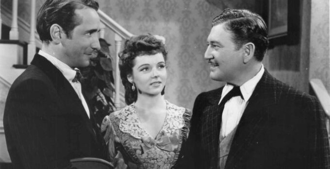 Victor Jory as Jeff Barat, Jane Wyatt as Eleanor Sager and Richard Dix as John Bonniwell in The Kansan (1943)