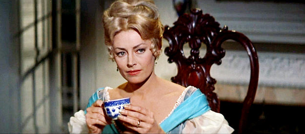 Victoria Shaw as Charity Warwick, a southern belle dining with a Union profiteer in Alvarez Kelly (1966)