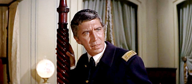 Patrick O'Neal as Maj. Albert Steadman, concerned someone is out to steal his herd of cattle in Alvarez Kelly (1966)