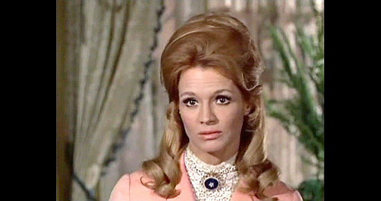 Angie Dickinson as Laura Breckenridge in Sam Whiskey (1969) 