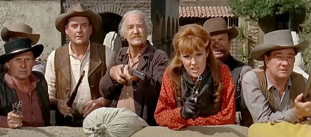 Barbara Rhoades as Penny Cushings and townsfolk prepared to defend against an Indian attack in The Shakiest Gun in the West (1968)