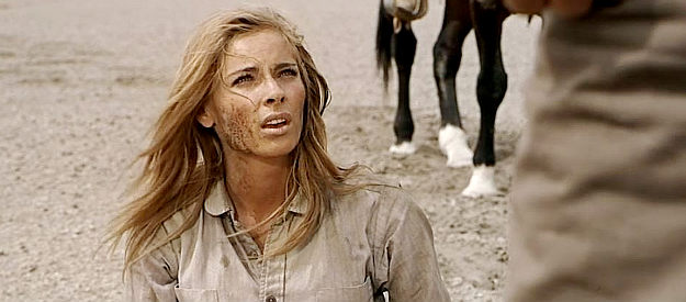 Camilla Sparve as Inga Bergmann, on the verge of being abandoned in the desert until MacKenna intervenes in MacKenna's Gold (1969)
