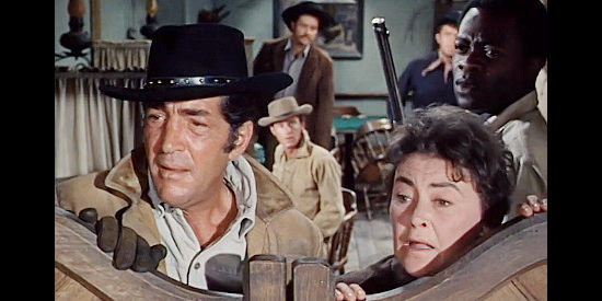 Dean Martin as Van Morgan, Ruth Springford as Mama Malone and Yaphet Kotto as Little George, alarmed by gunfire in Five Card Stud (1968)