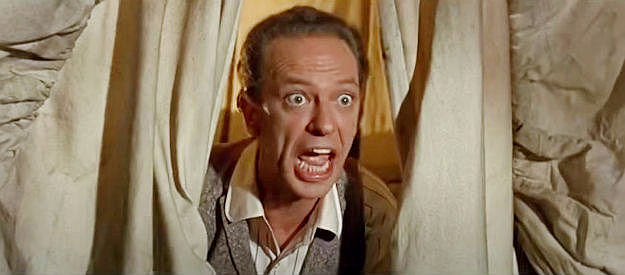 Don Knotts as Dr. Jesse Heywood, objecting to spending his wedding night guarding the wagon train in The Shakiest Gun in the West (1968)