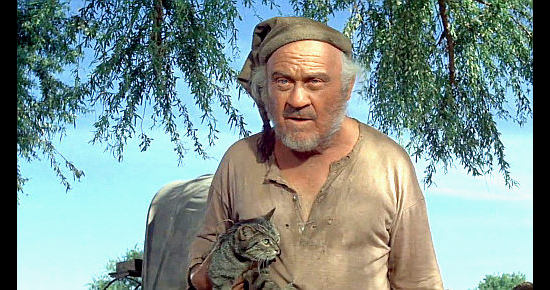Dub Taylor as McCartney, the cook for John Henry Thomas's outfit in The Undefeated (1969)