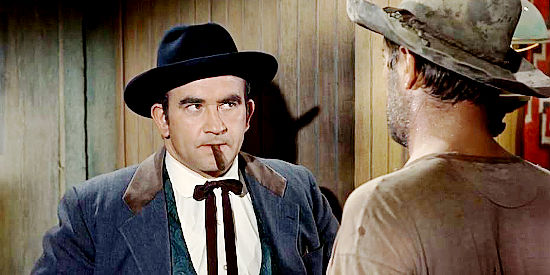 Edward Asner as Bart Jason, the man who wants water rights on land that isn't his in El Dorado (1967)