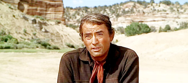 Gregory Peck as MacKenna, issuing a warning to John Colorado in MacKenna's Gold (1969)