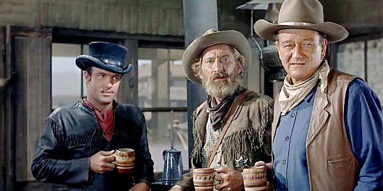 James Caan as Mississippi, Arthur Hunnicutt as Bull and John Wayne as Cole Thornton, waiting for J.P. to sober up in El Dorado (1967)
