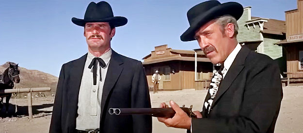 James Garner as Wyatt Earp and Jason Robards as Doc Holliday, refusing to be arrested at the O.K. Corral in Hour of the Gun (1967)