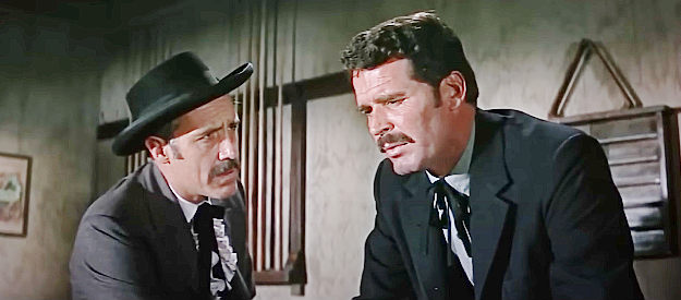 Jason Robards as Doc Holliday and James Garner as Wyatt Earp after the shooting of Morgan and Virgil in Hour of the Gun (1967)