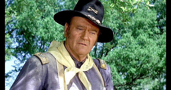 John Wayne as Col. John Henry Thomas in The Undefeated (1969)