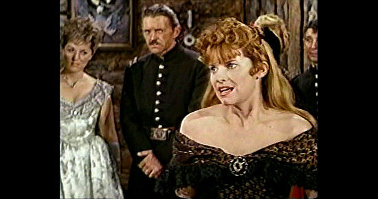 Julie Sommers as Caroline Reno apologizes for her drunken father in The Great Sioux Massacre (1965)