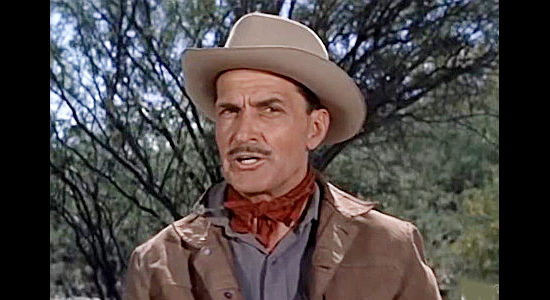 Kent Taylor as Johnny Barnes, trying to cash in on a former partner's demise in The Purple Hills (1961)
