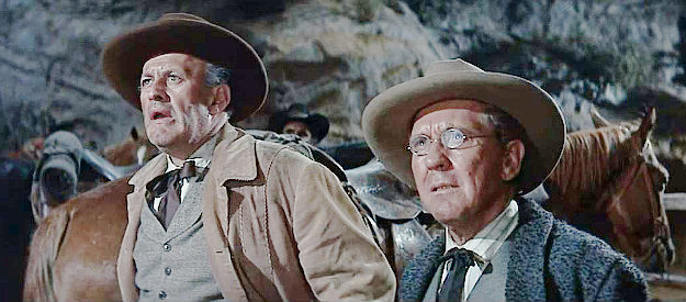 Lee J. Cobb as the editor and Burgess Meredith as the storekeeper, two townsmen who join the search for riches in MacKenna's Gold (1969)
