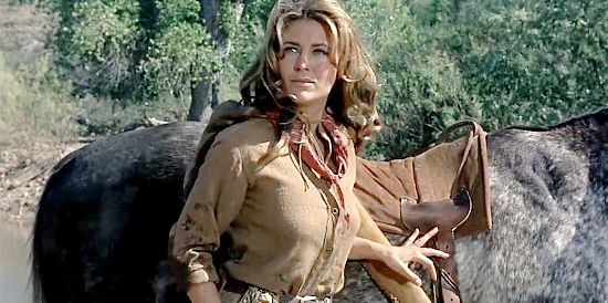 Michele Carey as Josephine McDonald, caught by Cole Thornton after ambushing him in El Dorado (1967)