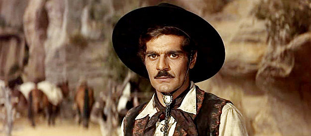 Omar Sharif as John Colorado, in a desperate search for the gold with more partners than he'd like in MacKenna's Gold (1969)