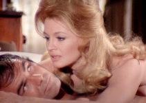 Burt Reynolds as Sam Whiskey being convinced by Angie Dickinson as Laura Breckenridge in Sam Whiskey (1969)