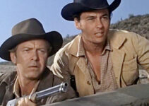 Gene Nelson as Gil Shepard and Jerry Summers as Martin Beaumont, trying to fend off an Apache attack in The Purple Hills (1961)