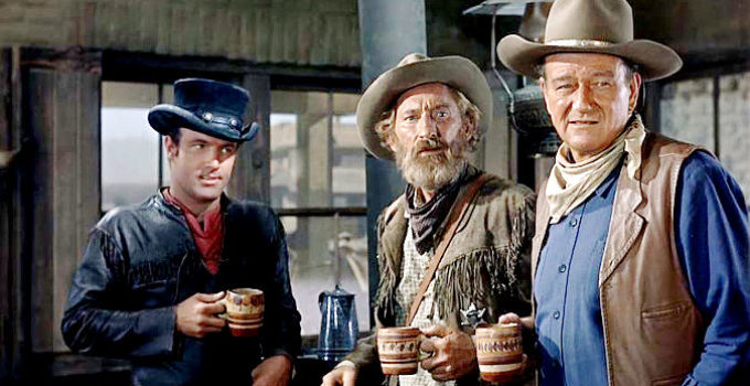 James Caan as Mississippi, Arthur Hunnicutt as Bull and John Wayne as Cole Thornton in El Dorado (1967)