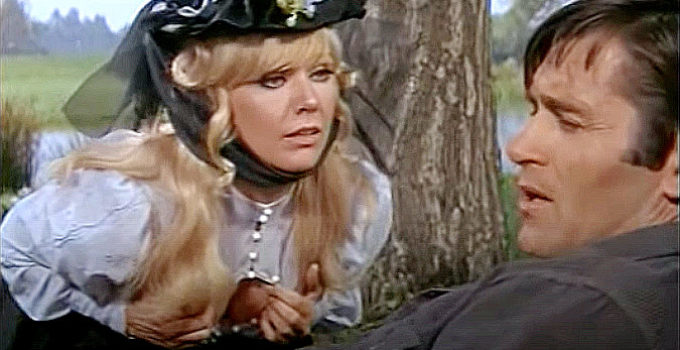 Kim Novak as Sister Lyda with Clint Walker as Ben Quick in The Great Bank Robbery (1969)