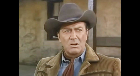Robert Taylor as Gallagher, a mine owner reunited with his son in Hondo and the Apaches (1967)