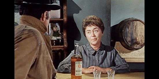Ruth Springford as Mama Malone, a saloon owner welcoming Van Morgan (Dean Martin) back to town in Five Card Stud (1968)