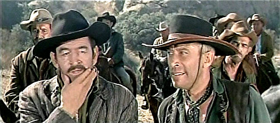 Ted de Corsia as Jud Spangler and his right-hand man Cagle (Mort Mills) dscuss their next move in The Quick Gun (1964)