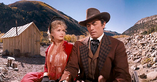 Debbie Reynolds as Lily Prescott and Gregory Peck as Cleve Van Valen learn her gold mine has played out in How the West Was Won (1962)