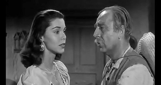 Eugenia Paul as Raquel Torena with her dad Miguel (Jan Arvan) in Gunfighters of Abilene (1960)