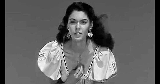 Eugenia Paul as Raquel Torena in Gunfighters of Abilene (1960)