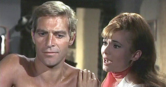 James Franciscus as Tuck Kirby and Gila Golan as T.J. Breckenridge talk over old times in The Valley of Gwangi (1969)