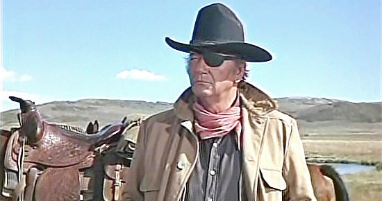John Wayne as Rooster Cogburn in True Grit (1969) 