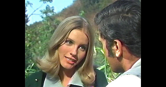Melodie Johnson as Lillie Malone, skeptical of Matt Stone's sweet talk in The Ride to Hangman's Tree (1969)
