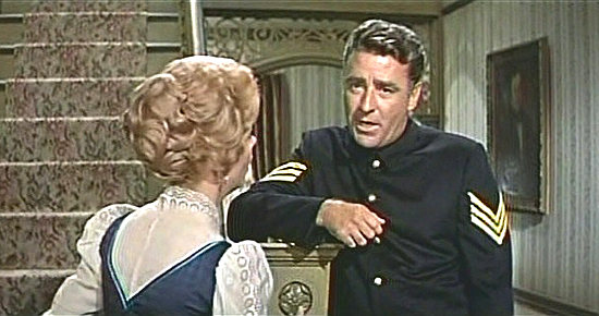 Peter Lawford as Sgt. Larry Barrett and fiancee Amelia Parent deal with unwelcome orders in Sergeants 3 (1962)
