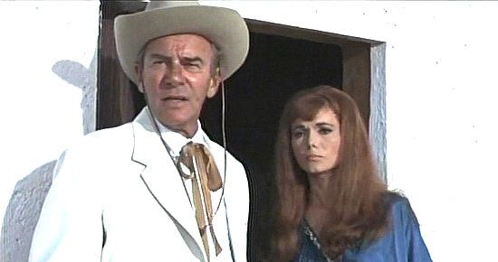 Richard Carlson as Champ Connors and Gila Golan as T.J. Breckenridge in The Valley of Gwangi (1969)