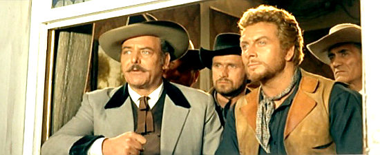 Alfonso Rojas as Amos Bransbury with right-hand man Barkley (Alfonso de la Vega) in Some Dollars for Django (1966)