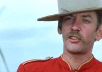 Donald Sutherland as Sgt. Dan Candy in Dan Candy's Law (1974)